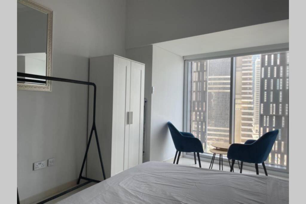 دبي Cayan Tower Luxury Apartment With Sea View المظهر الخارجي الصورة
