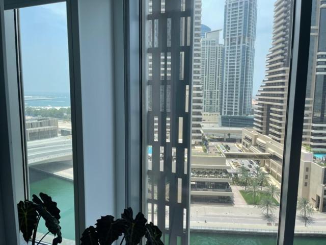 دبي Cayan Tower Luxury Apartment With Sea View المظهر الخارجي الصورة